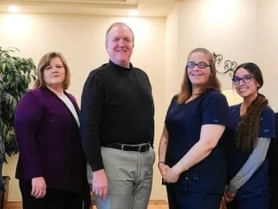 Dr. Paul Barlow with the Barlow Family Dentistry team